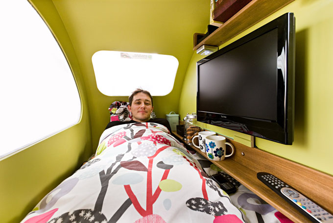 caravan-interior-with-person-in-bed
